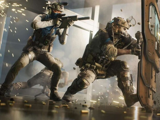 Battlefield 2042 soldier with a shield protects a soldier aiming down range