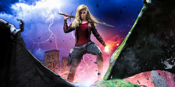 Blonde woman holding sword over her shoulder in a city environment, magic blooming in her left hand.